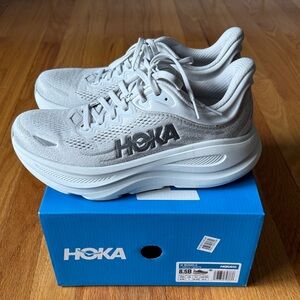 Hoka women’s Neutral Running Shoes in Light Gray and White